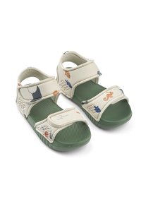 Lightweight sandals featuring a cream upper with colorful marine patterns, adjustable straps, and textured green rubber soles.