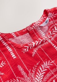 Unselected, red palm print