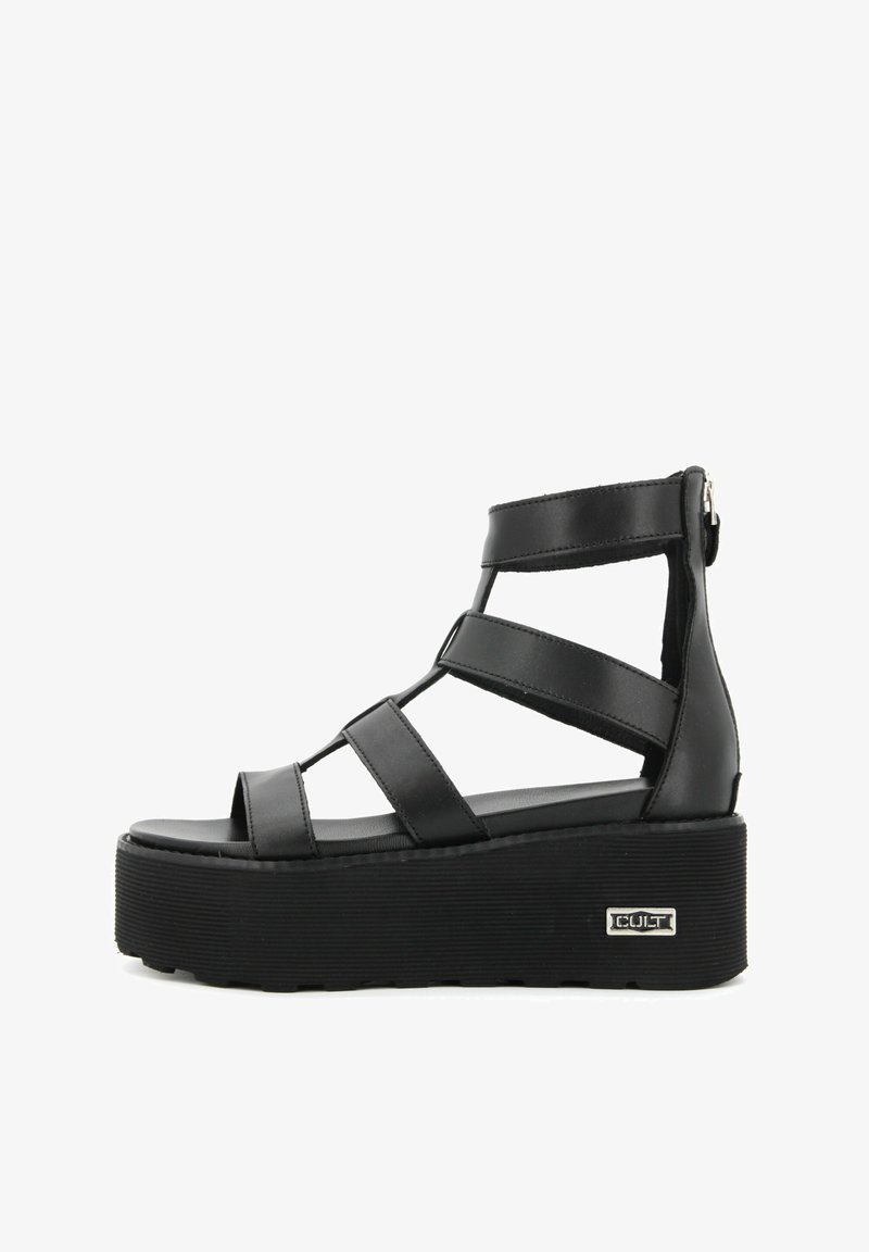 Sandali neri con piattaforma, caratterizzati da più cinturini, design aperto sulla punta e suola texture. Presentano una chiusura con zip sul retro e un logo del marchio.