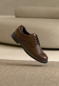Sélectionné, dark brown