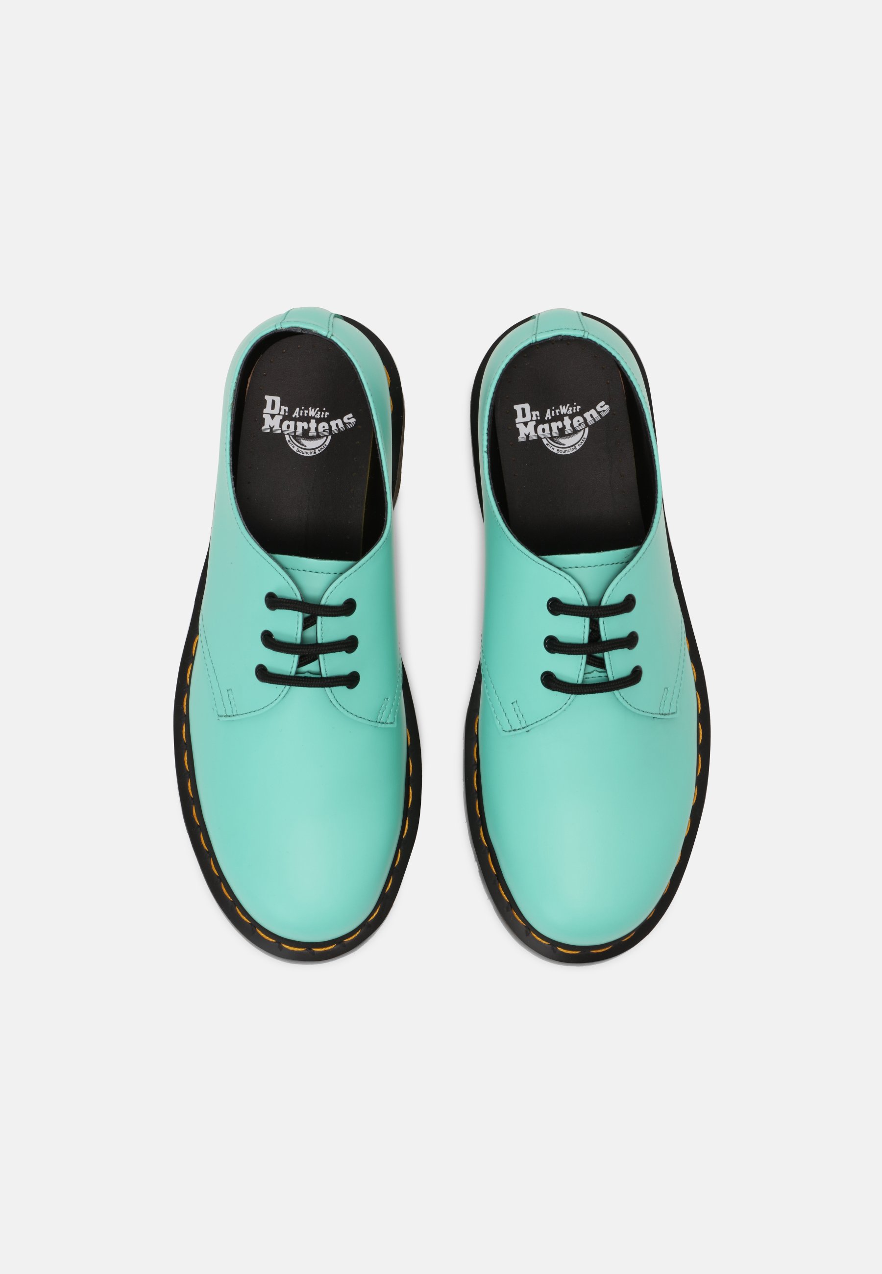 green smooth dr martens