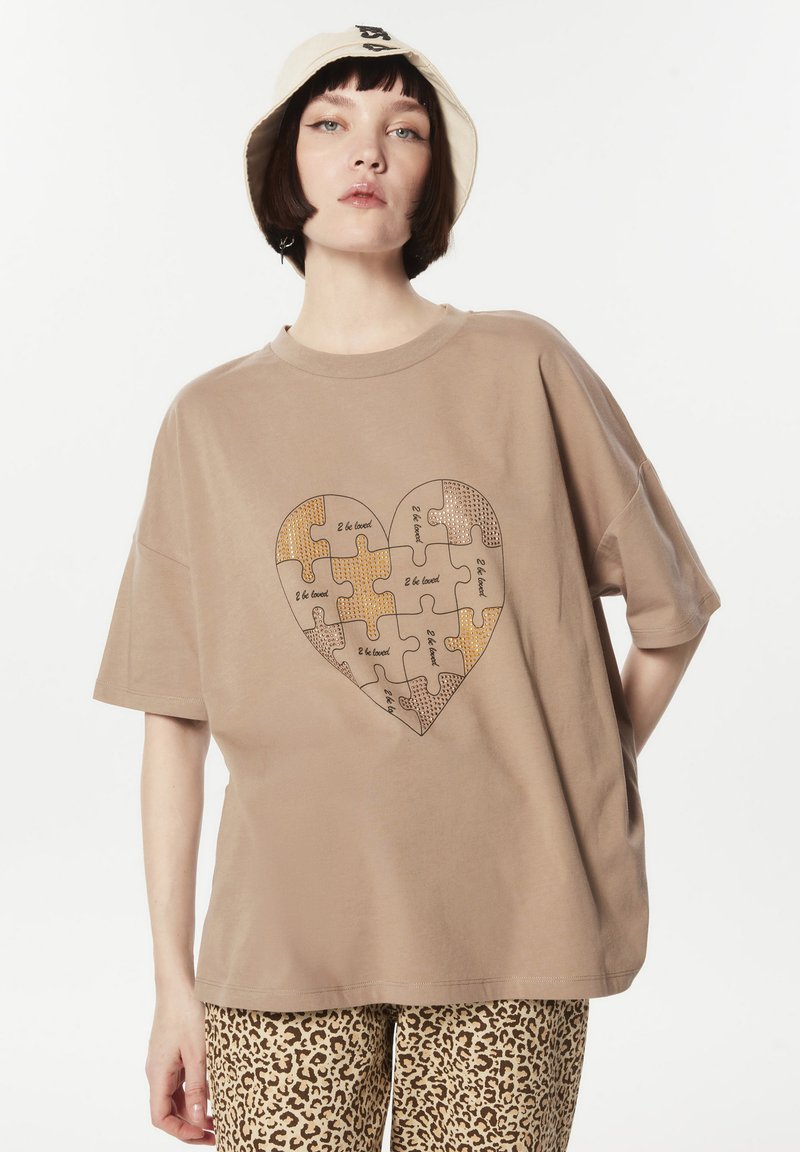 Okay, here's a German blog article about funny slogan clothing, designed to sound natural and engaging, and optimized for search engines.