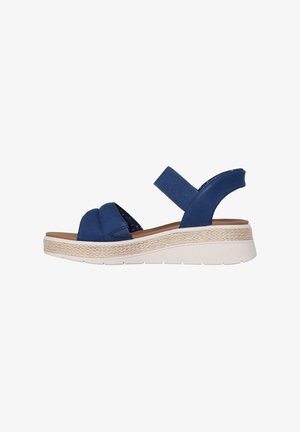 Blue fabric sandals with cross-over straps and elastic back strap; 4 cm wedge sole with raffia texture; cushioned footbed.