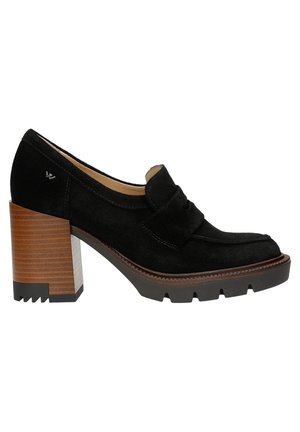 Black suede heeled shoe with a rounded toe and bow detail. Features a textured wooden block heel and treaded black platform.