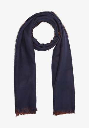 Écharpe bleu marine en matière douce avec un motif chevron, présentant des bords frangés de couleur brun foncé.