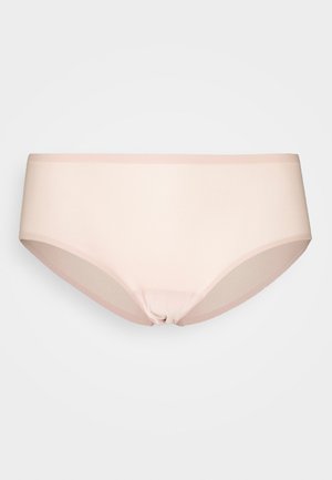 Lys rosa hipster undertøy laget av glatt stoff. Har en bred livlinje og en sømløs design med en lett glansfinish.