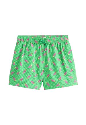 Short de bain vert avec motif flamant rose, taille élastique et cordon vert avec embouts roses.