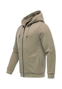 Kapuzensweatshirt in einem sanften Beigeton, mit durchgehendem Reißverschluss, verstellbaren Kordeln und gerippten Bündchen. Glatte Stofftextur.
