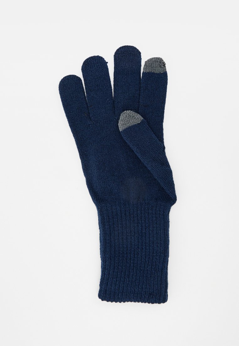 Gant en tricot bleu marine avec des bouts gris sur le pouce et l'index, à poignet côtelé, conçu pour une utilisation avec les écrans tactiles.