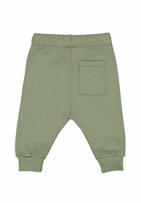 Jogger in cotone verde con vita elasticizzata, polsini a coste e tasca posteriore. Texture liscia e design affusolato per il massimo comfort.