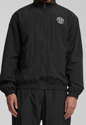 Chaqueta de entrenamiento - black