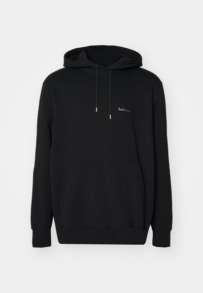 Black hoodie made of textured cotton with a front pocket, drawstring hood, and small red embroidered logo on the chest.