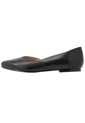 Black leather flat shoe with a pointed toe, low heel, and a slightly open upper design. Smooth texture with minimal stitching details.