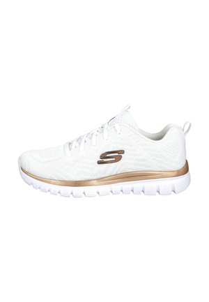 Zapatilla deportiva blanca con parte superior de malla, entresuela dorada metálica, suela blanca y un logo metálico de "S" en el lateral.