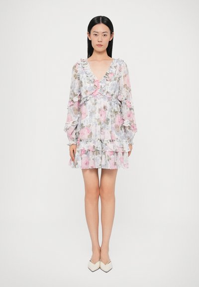 Floral dress in light gray with pink and green patterns. Features ruffled neckline and sleeves, tiered skirt, and a fitted bodice.