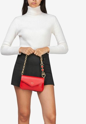 Miriade Clutch - rosso