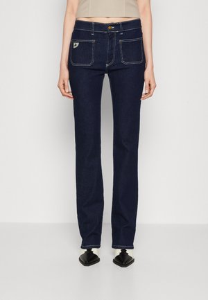 Flared Jeans - rinsed denim