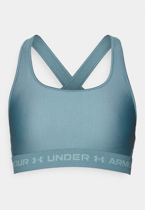 Ajánlott sportmelltartó kékeszöld árnyalatban, sima anyagból készült. Keresztpántokkal és márkázott gumival a alján.