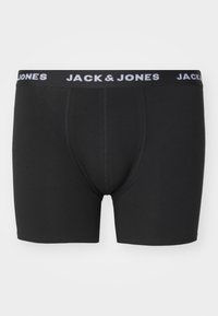 Schwarze Boxer-Bryce aus einem weichen Material mit eng anliegender Passform. Mit einem schwarzen Bund, der "JACK & JONES" in weißen Buchstaben zeigt.