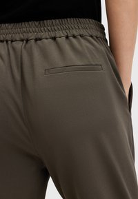 AllSaints ALEIDA TRI - Pantaloni - green