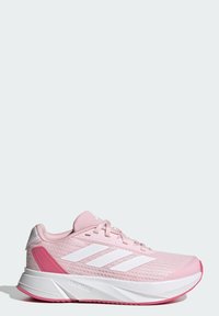 Scarpe da corsa di un rosa chiaro con tomaia in rete, design a tre strisce bianche e un accento rosa sul tallone. Suola spessa bianca per un maggiore comfort.