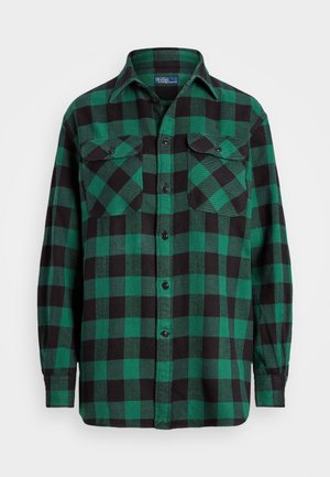 Long-sleeve green and black checkered flannel shirt with button front and two chest pockets with buttoned flaps.