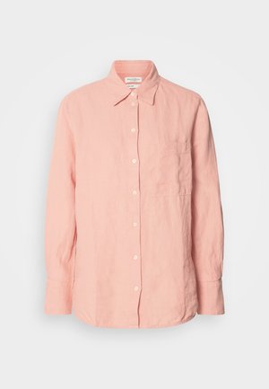 Világos rózsaszín vászoning, galléros nyakkal, gombos elülső résszel, hosszú ujjal és bal oldalon zsebből. Texturált anyag, laza szabással.