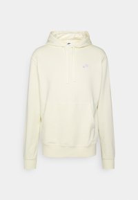 Světle žlutá mikina Nike vyrobená z měkké tkaniny, s přední kapsou, šňůrkami a malým bílým logem na hrudi.