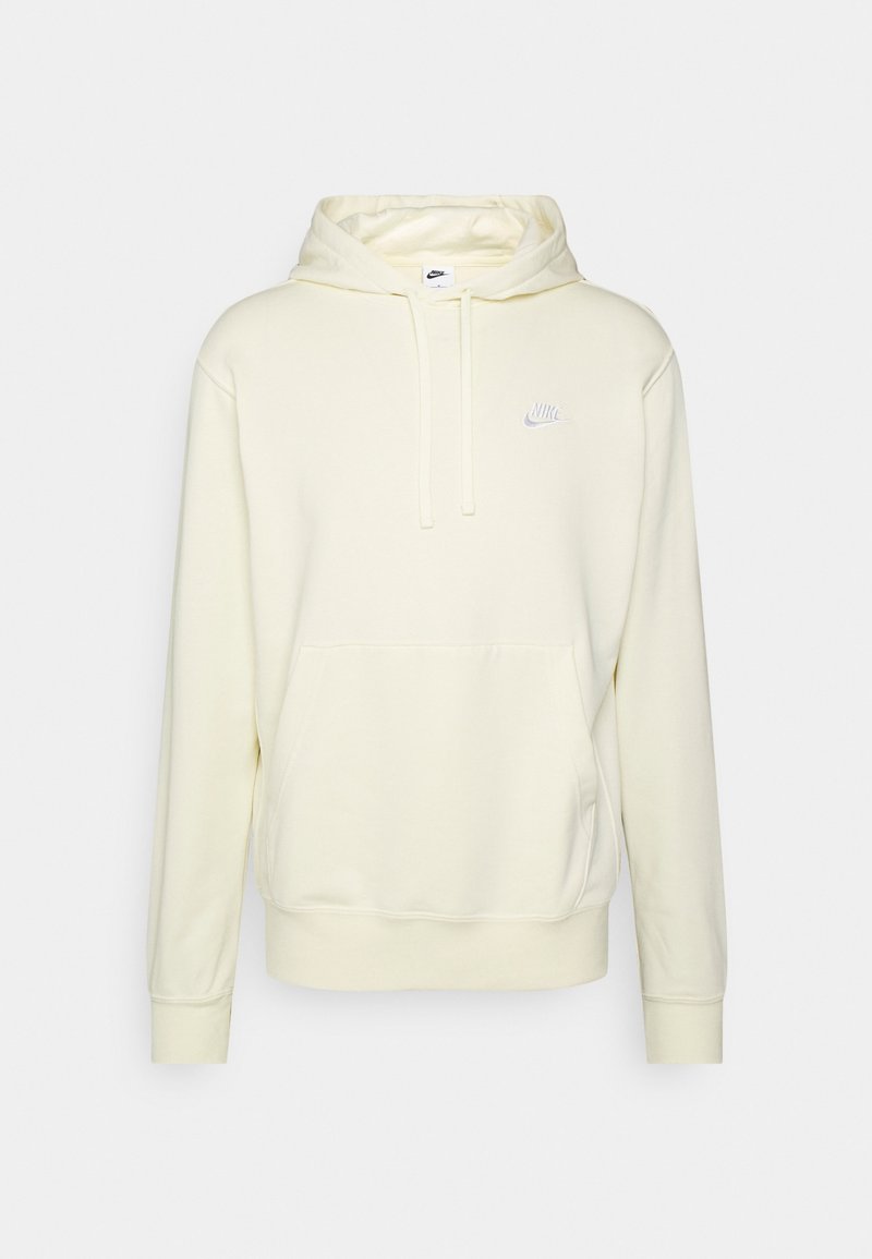 Světle žlutá mikina Nike vyrobená z měkké tkaniny, s přední kapsou, šňůrkami a malým bílým logem na hrudi.