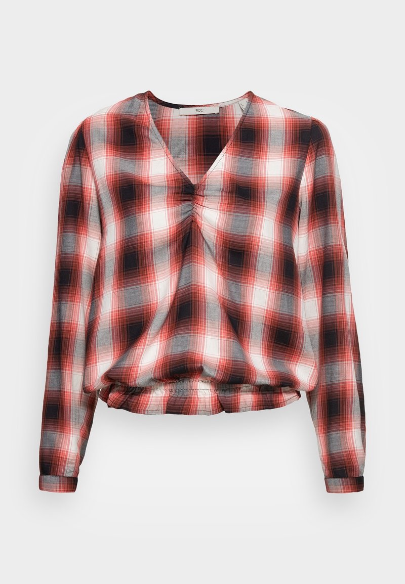 Blouse à manches longues à carreaux rouges et noirs avec col en V, détail froncé à la taille et ourlet élastique. Tissu léger, légèrement transparent.