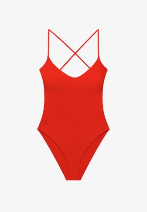 Costum de baie roșu întreg, cu bretele subțiri încrucișate pe umeri și decolteu rotund, destinat femeilor.