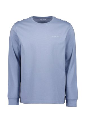 Jasnoniebieska koszula z długim rękawem wykonana z miękkiego materiału. Posiada okrągły dekolt i mankiety na rękawach. Małe haftowane logo na piersi.