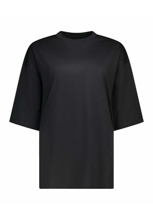 T-shirt noir oversize à manches courtes avec col rond, design uni, coupe ample, présenté sur fond blanc.