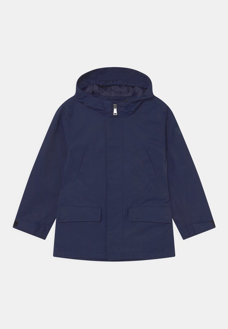 Marinblå huva jacka med en framtida dragkedja, två stora fickor och rak skärning. Slät textur med matt finish.