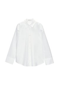 Chemise blanche à manches longues avec boutons et col classique. Fabriquée en tissu lisse avec une coupe décontractée et un ourlet arrondi. Design simple, sans motifs.