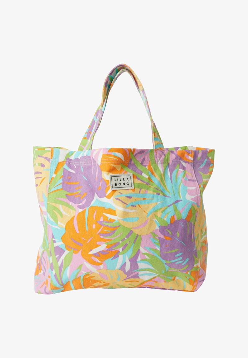 Sac tote en tissu avec un motif de feuilles tropicales multicolores. Comprend des poignées robustes à motifs et une étiquette de marque sur un côté.