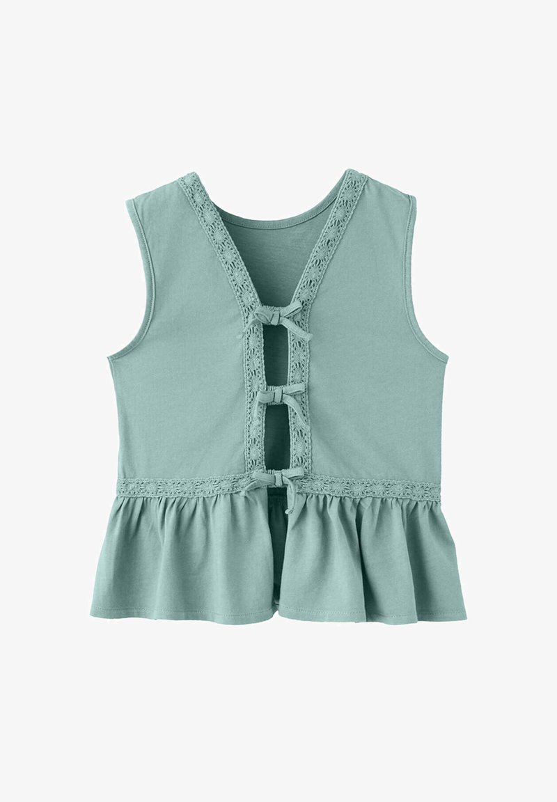 Haut vert sans manches avec trois ouvertures en forme de goutte devant nouées avec des nœuds, bordure en dentelle le long du décolleté et de la taille, et ourlet évasé.