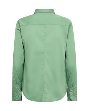 Hele rohelise värviga pikkade varrukatega pluus volangidega mansettide ja sirge seljasaumiga, nähtud tagant valgel taustal.