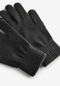 Dunkelgraue Strickhandschuhe mit einer weichen Textur, ausgestattet mit fünf Fingeröffnungen und gerippten Bündchen für einen engen Sitz.