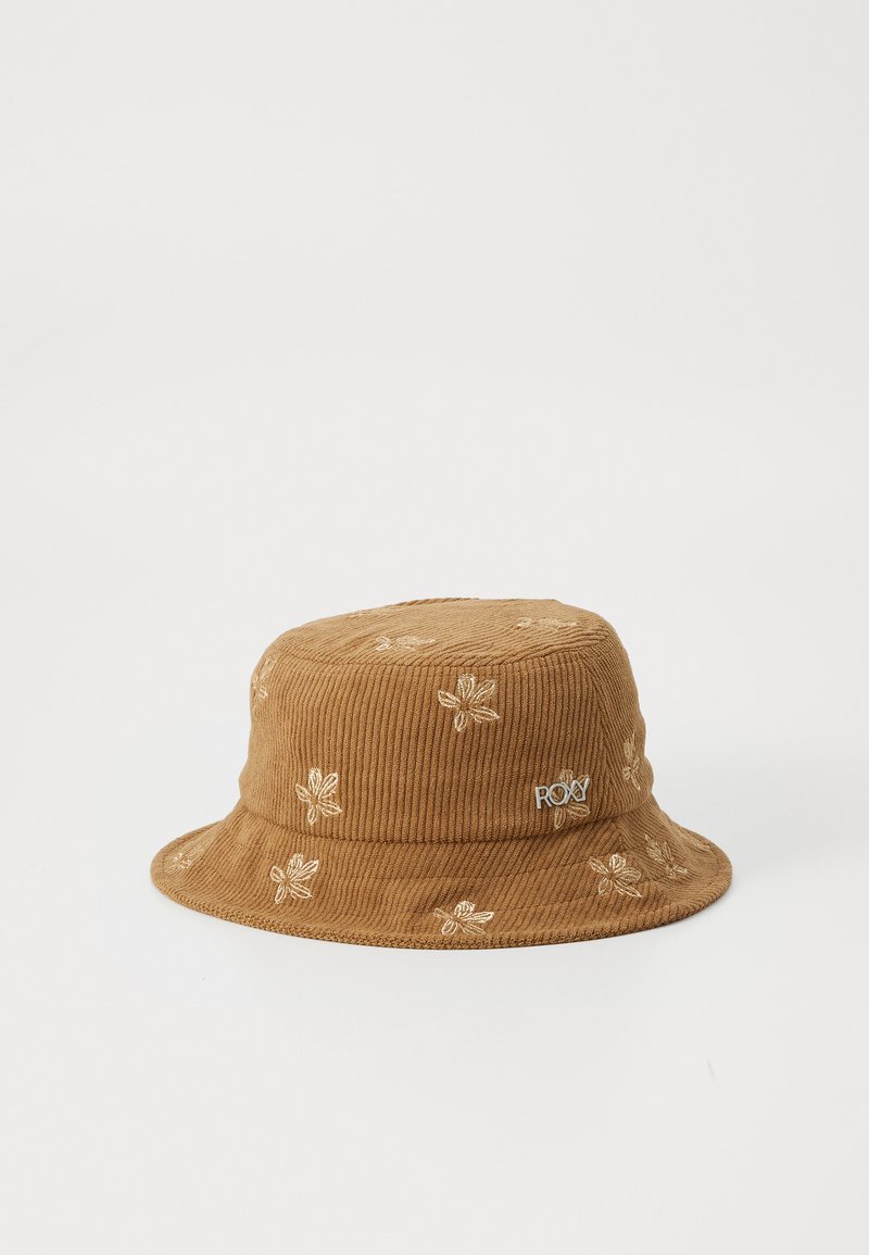 Bruine corduroy bucket hat met een bloemenborduursel en een zilveren Roxy-logo aan de zijkant. Zachte textuur, ronde kroon, bredere rand.