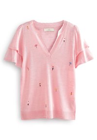 Jersey corto de manga corta en rosa claro con escote en V y patrones bordados de conos de helado y piruletas. Textura de punto suave.