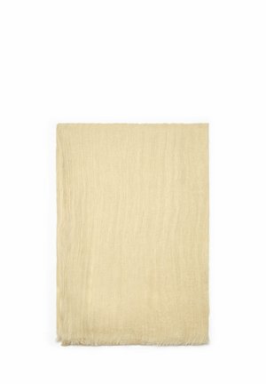 Lyse beige rektangulært tørklæde med subtil struktur og frynser på kanterne, pænt foldet på en hvid baggrund.