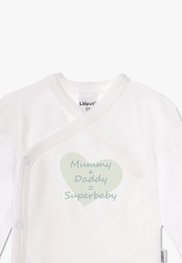 White cotton baby bodysuit with a wrap design, featuring a light green heart graphic with the text "Mummy + Daddy = Superbaby."