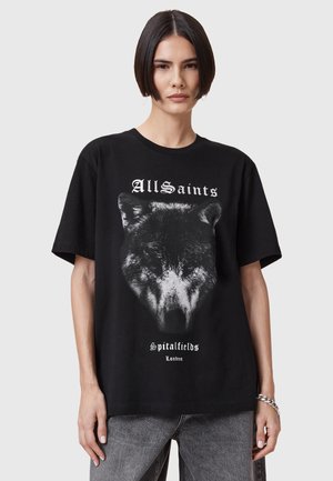 Musta puuvillapaita, jossa on väljä muotoilu. Etuosassa on graafinen painatus suden päästä ja valkoiset tekstit "AllSaints Spitalfields London".