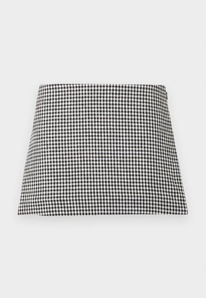 Black and white checkered A-line mini skirt with a side zipper closure on a plain background.