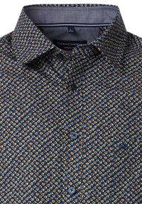 Casual button-up shirt in dark blue fabric with a multicolored, small leaf pattern. Features a standard collar and black buttons.
