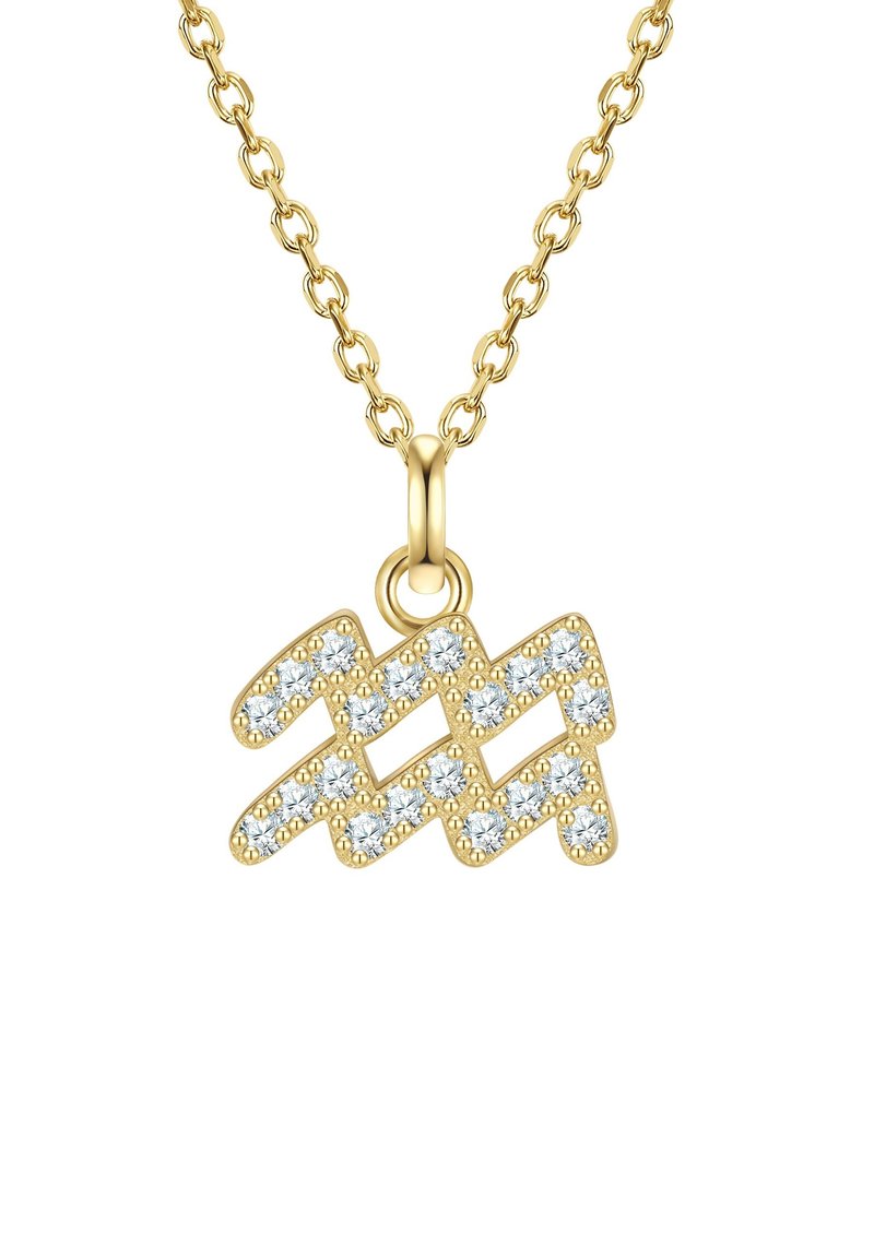 Auksinės spalvos kaklo grandinėlė su zigzago formos pakabuku, puoštu skaidriais, blizgančiais akmenukais. Grandinėlės akys yra apvalios ir poliruotos.