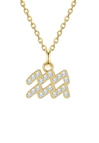 Collier doré mettant en valeur un pendentif en zigzag orné de pierres claires et étincelantes. Les maillons de la chaîne sont ronds et polis.