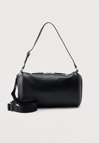 Black, smooth leather handbag with a cylindrical shape, featuring a single adjustable strap. Silver hardware and top zipper closure detail.