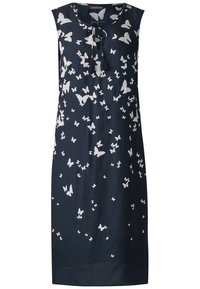 Mörkblå ärmlös klänning med rund hals och nyckelhålsdetalj, prydd med ett vitt fjärilstryck över hela. Slät tygkvalitet med en avslappnad passform.